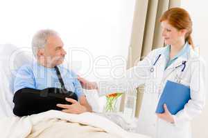 Hospital - female doctor examine senior patient