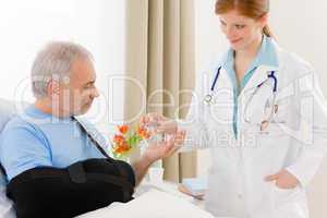 Hospital - female doctor give pill patient
