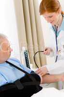 Hospital - doctor check blood pressure patient