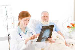 Hospital - female doctor examine x-ray patient