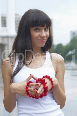 Woman with beads Woman with beads