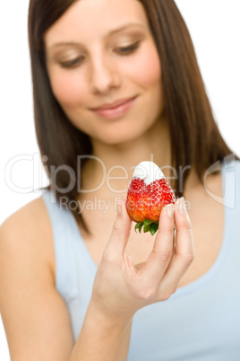 Healthy lifestyle - woman eat strawberry
