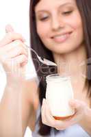 Healthy lifestyle - woman eat yogurt
