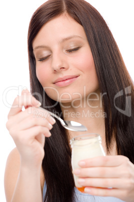 Healthy lifestyle - woman enjoy yogurt