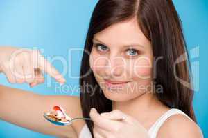 Healthy lifestyle - woman eat cereal yogurt