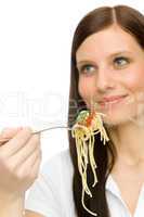 Italian food - healthy woman eat spaghetti sauce