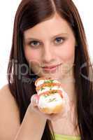 Healthy lifestyle - woman enjoy caprese sandwich