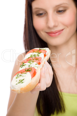 Healthy lifestyle - woman enjoy caprese sandwich