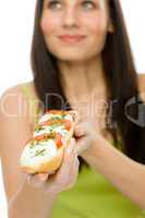 Healthy lifestyle - woman enjoy caprese sandwich