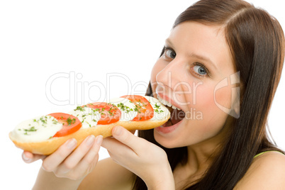 Healthy lifestyle - woman eat caprese sandwich