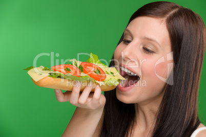 Healthy lifestyle - woman bite cheese sandwich