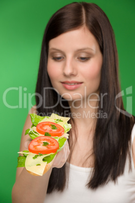 Healthy lifestyle - woman enjoy cheese sandwich