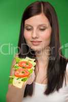 Healthy lifestyle - woman enjoy cheese sandwich