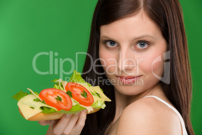 Healthy lifestyle - woman enjoy cheese sandwich