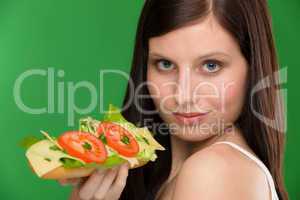 Healthy lifestyle - woman enjoy cheese sandwich