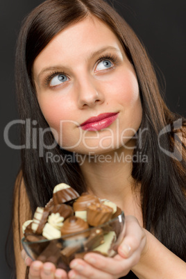 Chocolate - portrait young woman enjoy candy