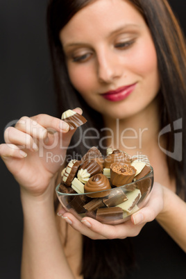 Chocolate - portrait young woman enjoy candy