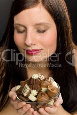 Chocolate - portrait young healthy woman enjoy candy