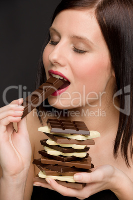 Chocolate - portrait healthy woman eat sweets