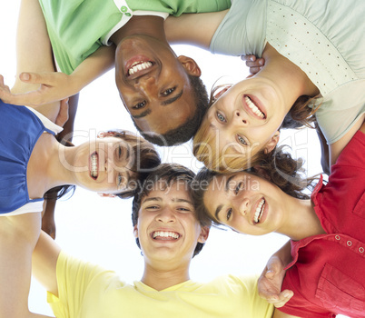 Group Of Teenagers Looking Down Into Camera