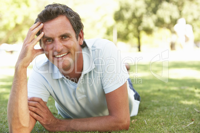 Portrait Of Young Man In Park