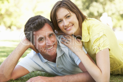 Portrait Of Romantic Couple In Park