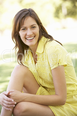 Portrait Of Young Woman In Park