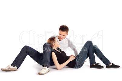 Casual Couple Lying Down on White