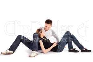 Casual Couple Lying Down on White