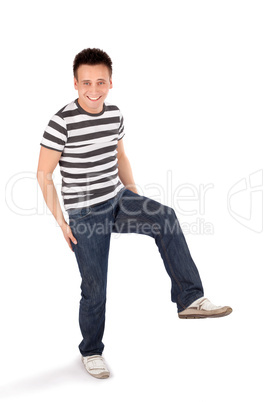 Happy Casual Man Standing on One Leg