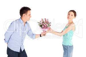 Casual Man Giving Flowers to Girlfriend