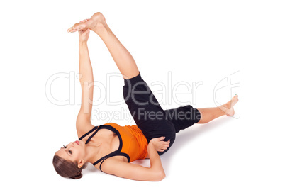 Woman Practicing Reclining Big Toe Yoga Pose