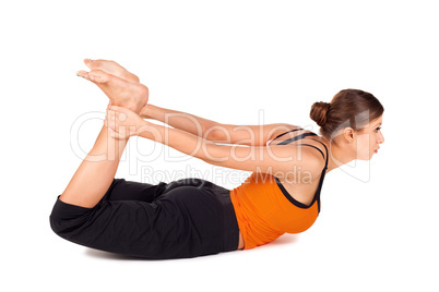 Woman Practicing Yoga Exercise Called Bow Pose