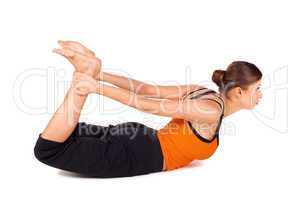 Woman Practicing Yoga Exercise Called Bow Pose