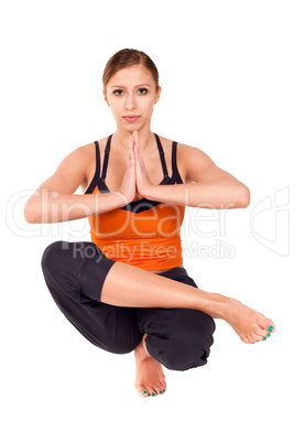 Young Fit Woman Practicing Yoga Exercise