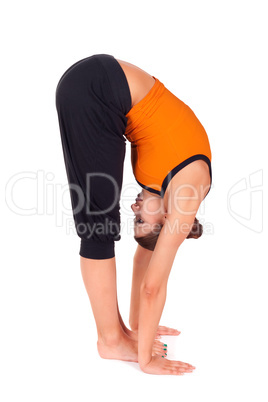 Woman Practicing Standing Forward Bend Yoga Exercise