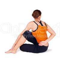 Woman Practicing Twist Pose Yoga Exercise