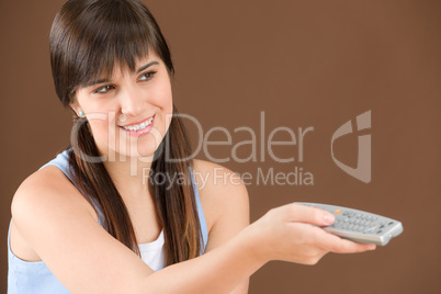 Woman teenager hold remote control