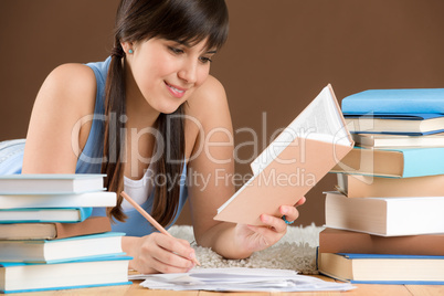 Home study - woman teenager write notes