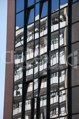 Residential Building Reflection in Windows