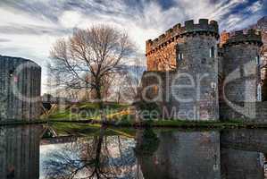 Whittington Castle in Shropshire reflecting on moat