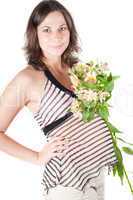 Portrait of pretty pregnant woman with flowers
