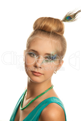 Smiling young woman in green dress.