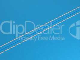 Blue diagonal stitched leather background