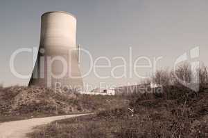 Dirty road to a nuclear power plant in an apocalypic scene