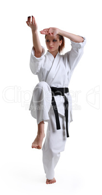 Karate. Young girl in a kimono