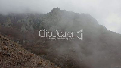 Time lapse of foggy mountain landscape