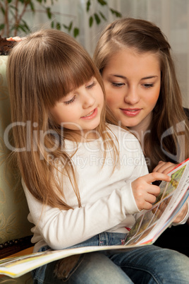 Two Sisters Reading