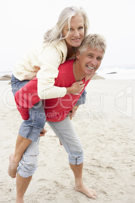 Senior Man Giving Woman Piggyback