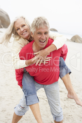 Senior Man Giving Woman Piggyback